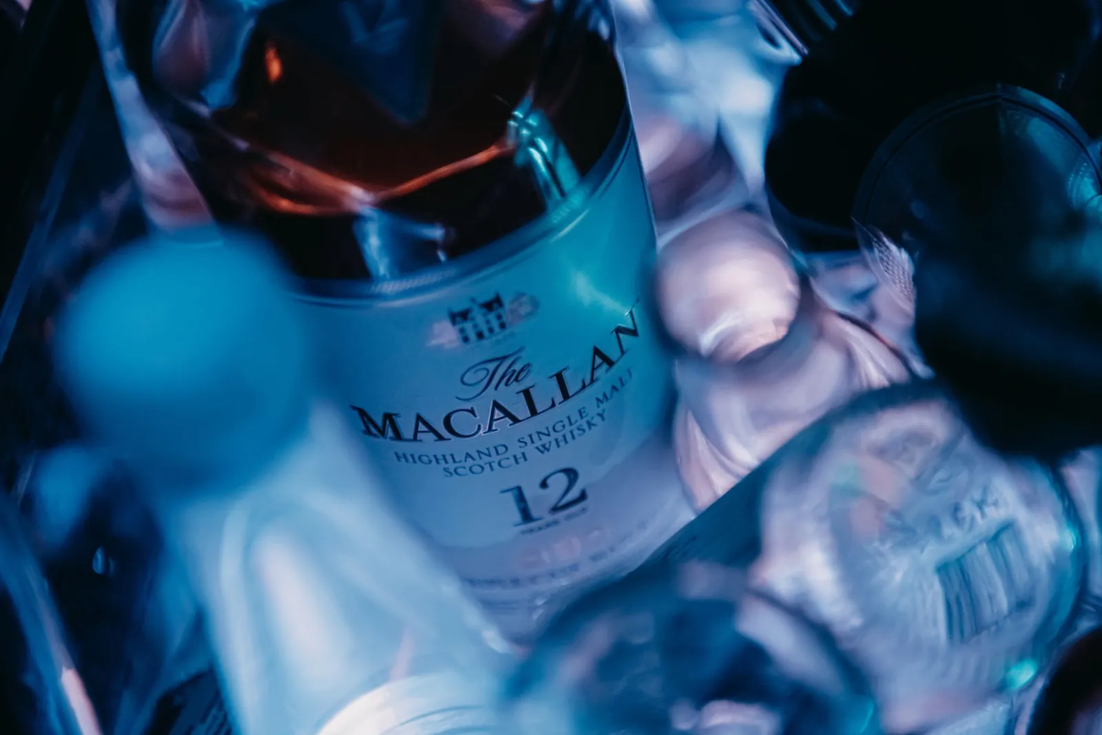 Close-up of The Macallan 12 Year Scotch Whiskey bottle, emphasizing luxury and indulgence. Stock photo illustrating Piccadily Agro Industries' product launched story.