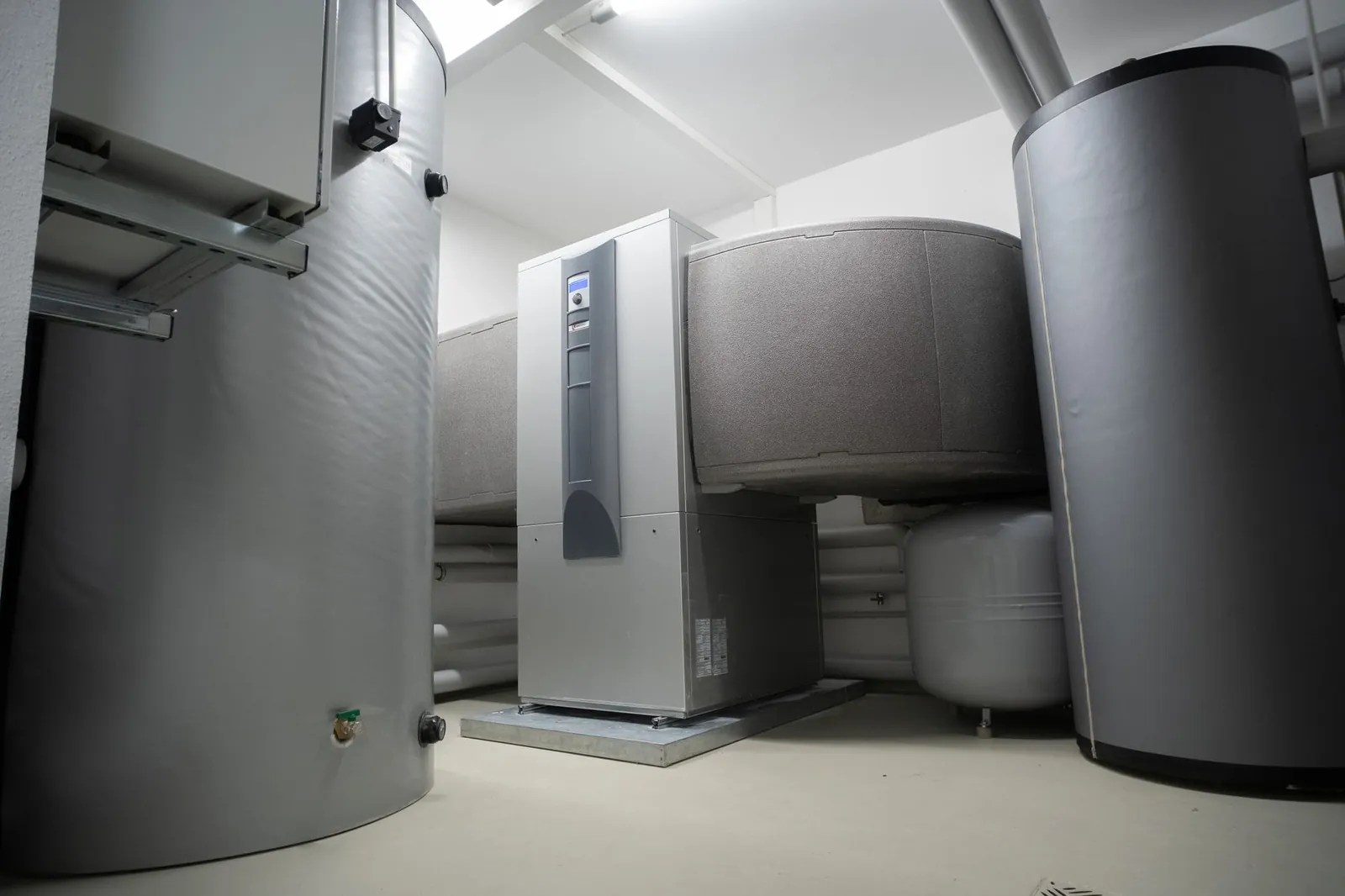 Efficient and innovative heat pump system in an indoor setting for advanced heating solutions. Stock photo illustrating Enviro Infra Engineers' earning call story.