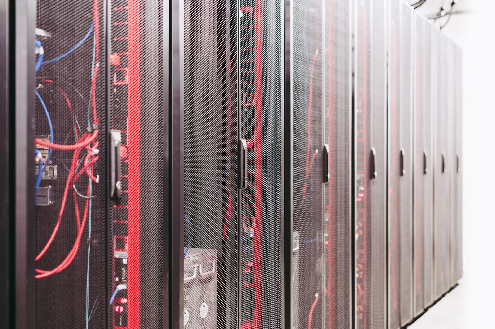 System with various wires managing access to centralized resource of server in data center. Stock photo illustrating STL Networks' new order story.
