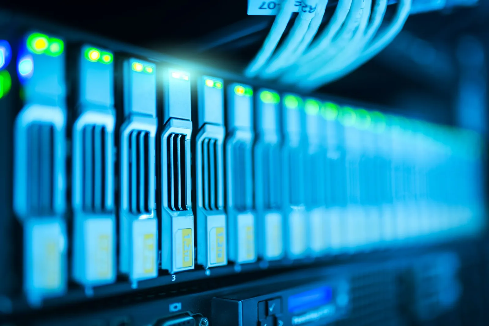 Detailed image of a server rack with glowing lights in a modern data center. Stock photo illustrating Blue Cloud Softech Solutions' new order story.
