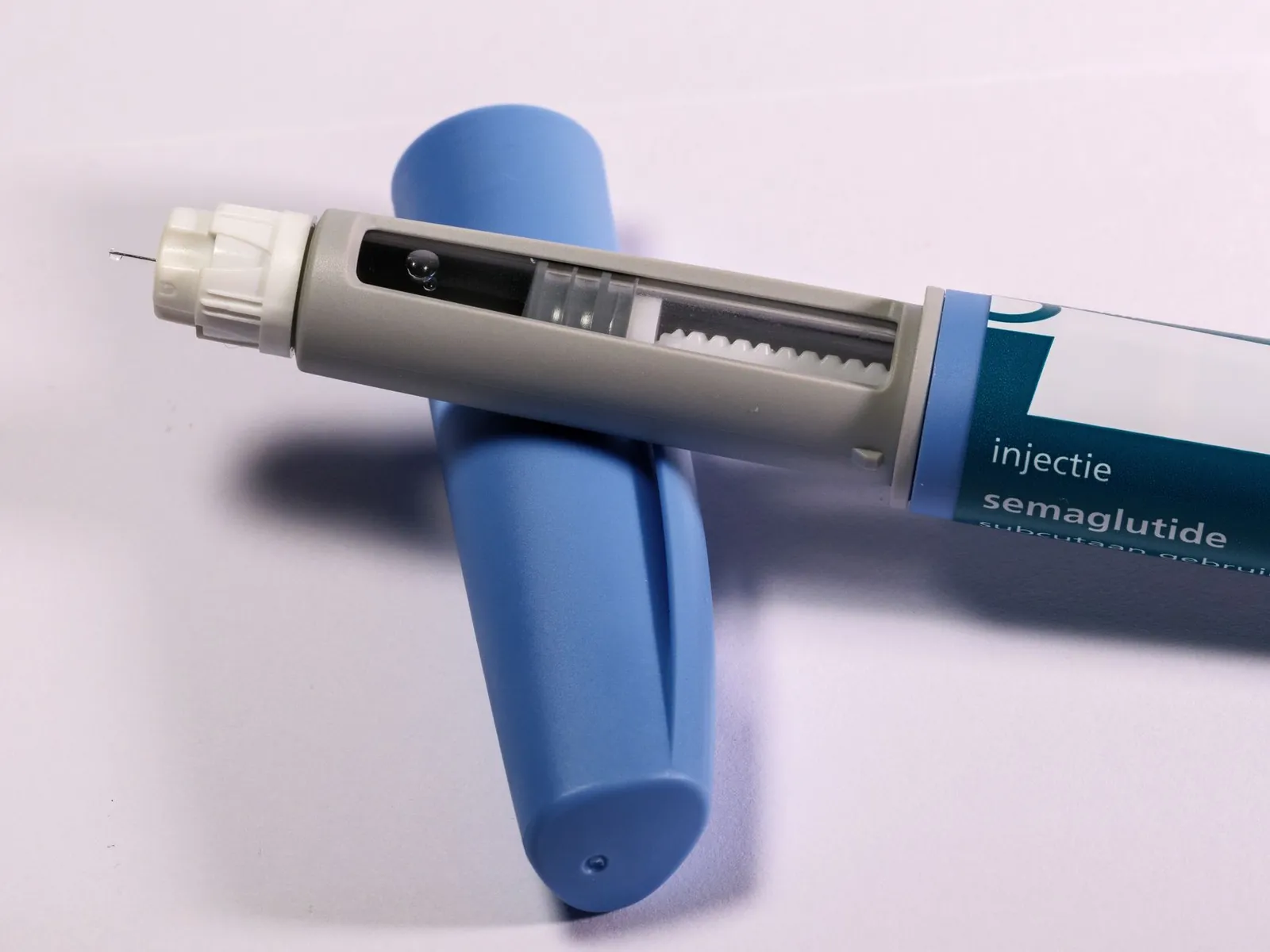 Detailed view of a semaglutide injection pen, commonly used for diabetes treatment, on a plain background. Stock photo illustrating Alkem Laboratories' product launched story.