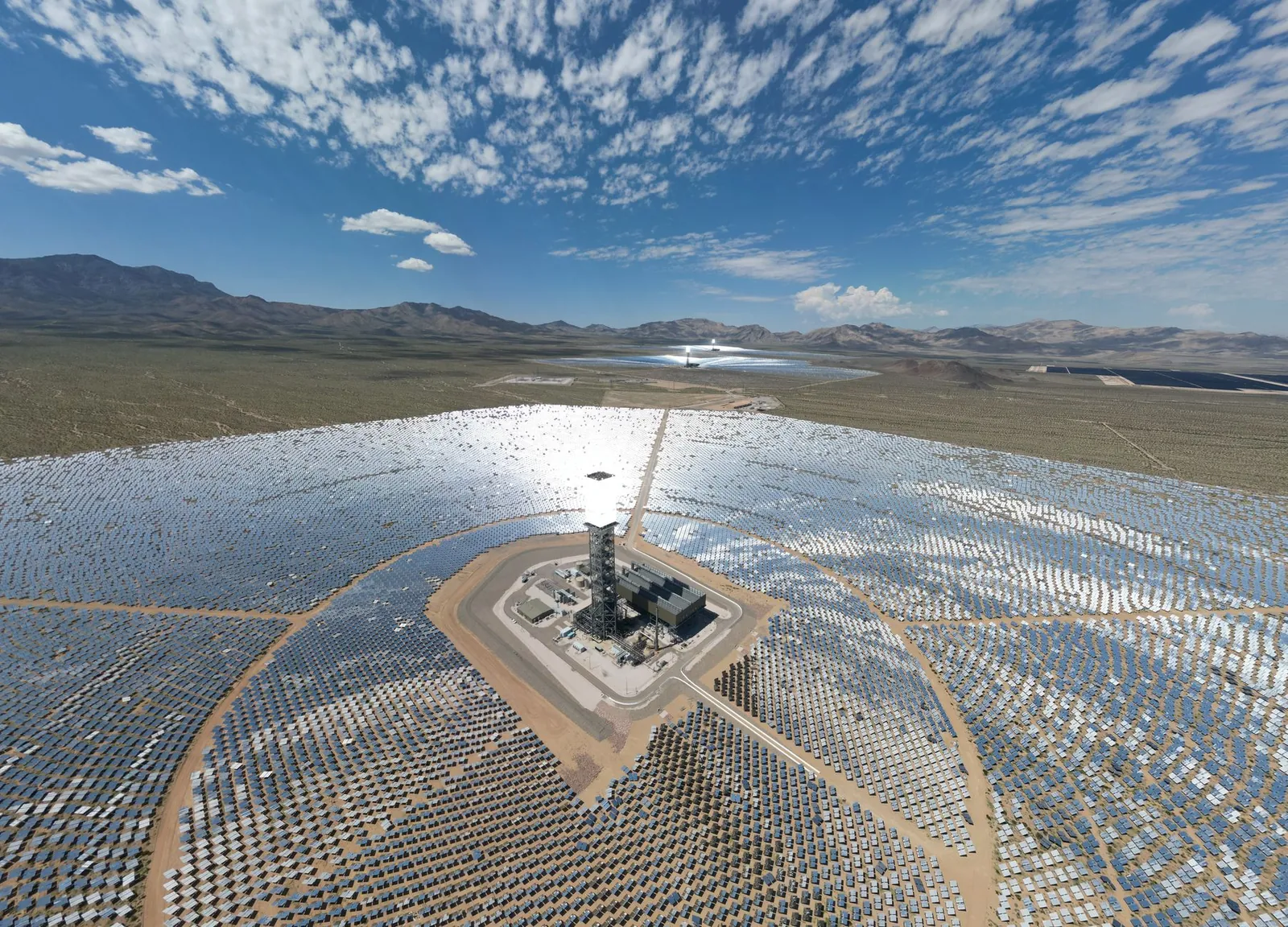 Aerial view of solar farm in Wheaton Springs, CA with vibrant sky and desert landscape. Stock photo illustrating Solex Energy's new order story.