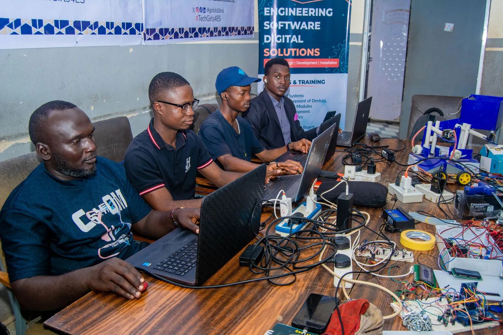 Group of engineers working together on digital solutions in a collaborative workspace. Stock photo illustrating LTM's product launched story.