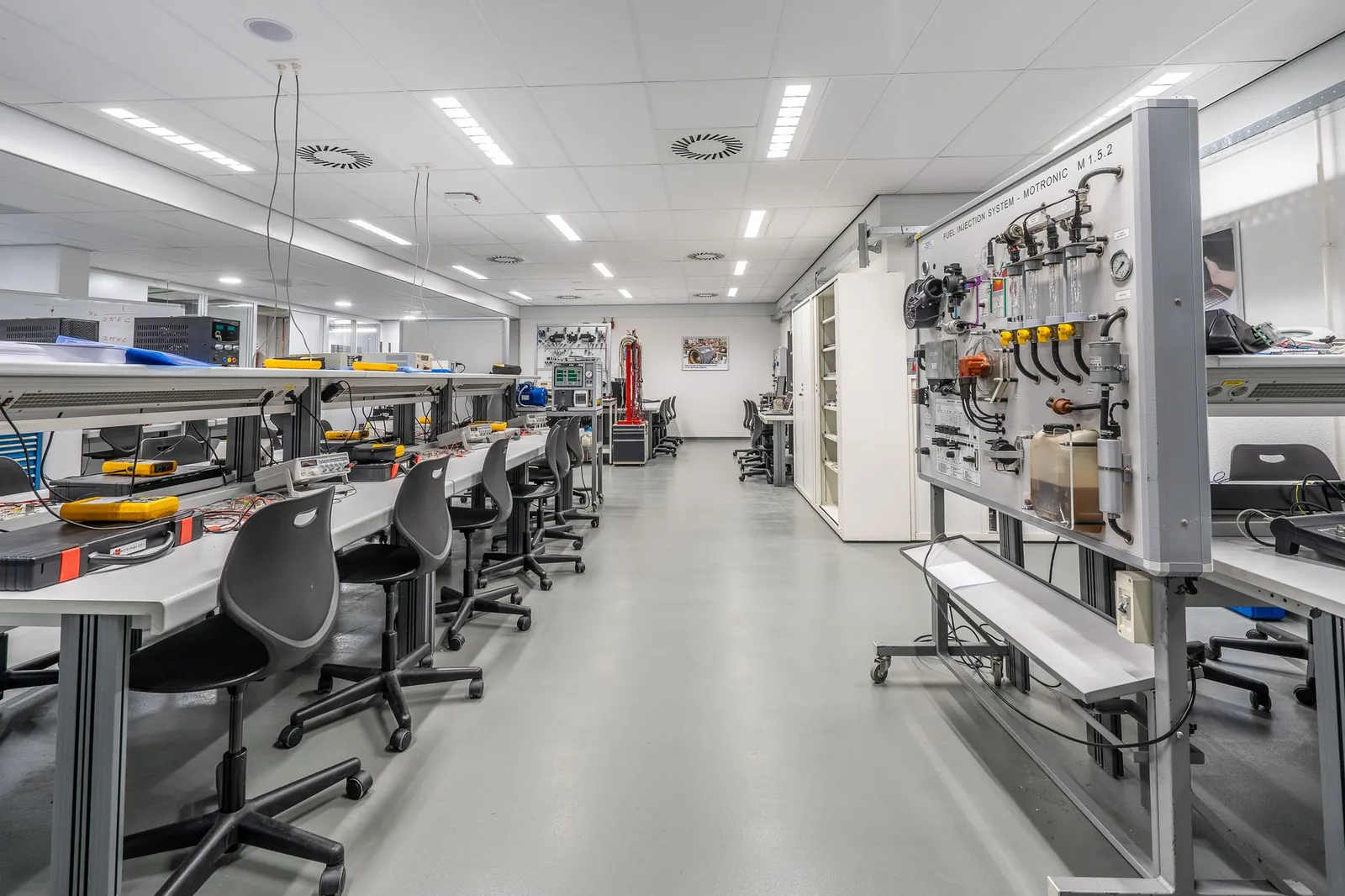 Spacious modern laboratory with workstations and equipment, ideal for scientific research and experiments. Stock photo illustrating Pace Digitek's expansion story.