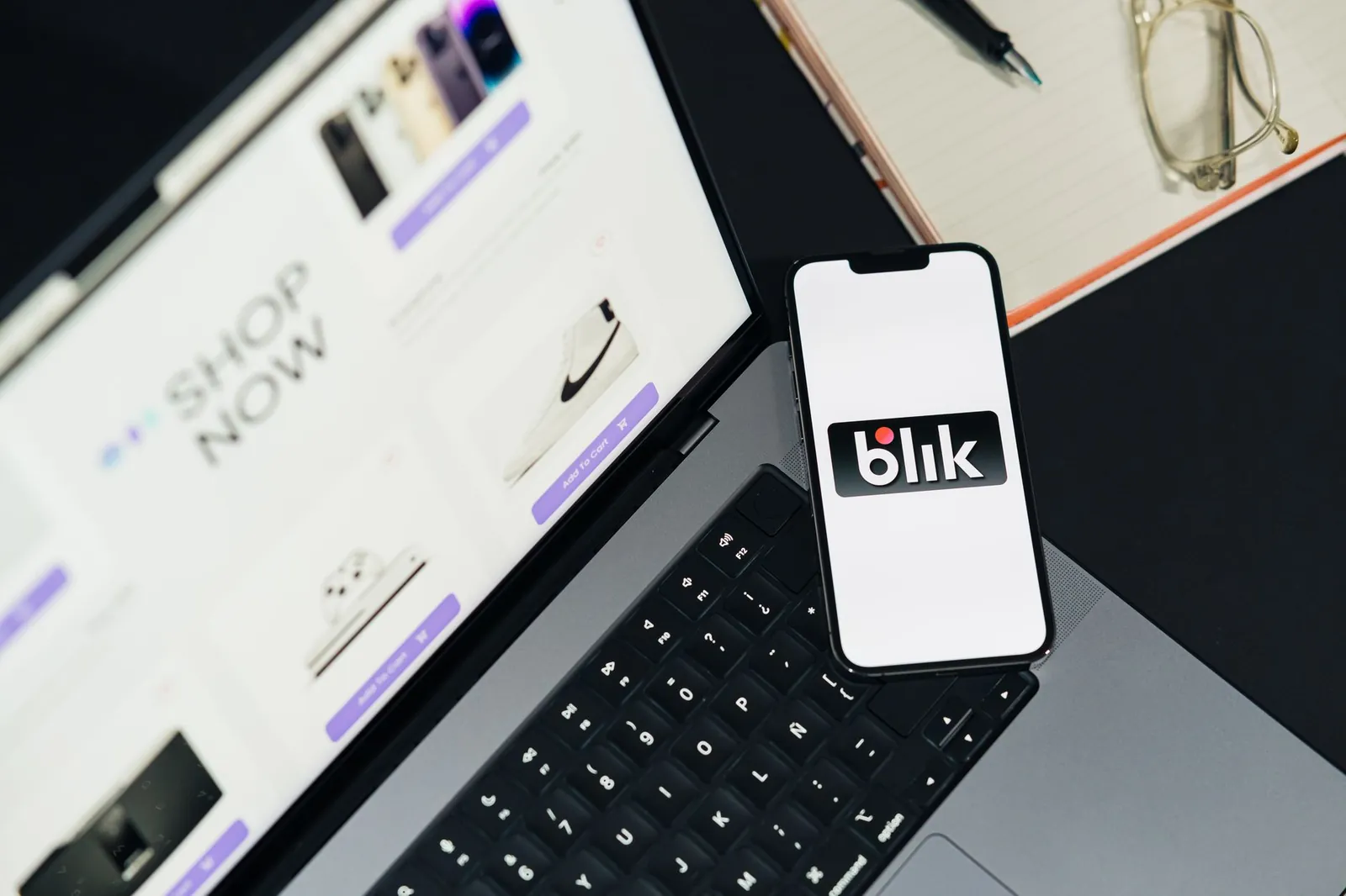 A laptop and smartphone displaying online shopping platforms, hinting at e-commerce trends. Stock photo illustrating SBC Exports' product launched story.