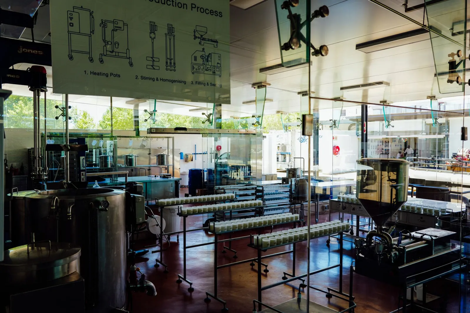 Spacious and modern food production plant interior with industrial machinery and processing line. Stock photo illustrating Vadilal Enterprises' partnership story.