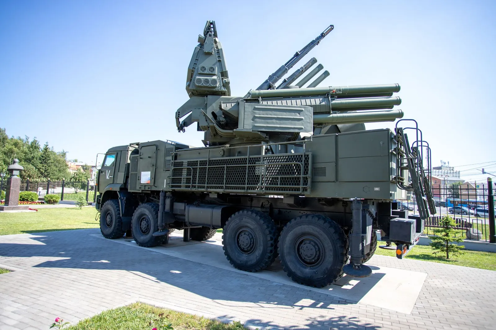 Outdoor display of a military missile defense system on a sunny day, highlighting its structure. Stock photo illustrating Bharat Dynamics' new order story.