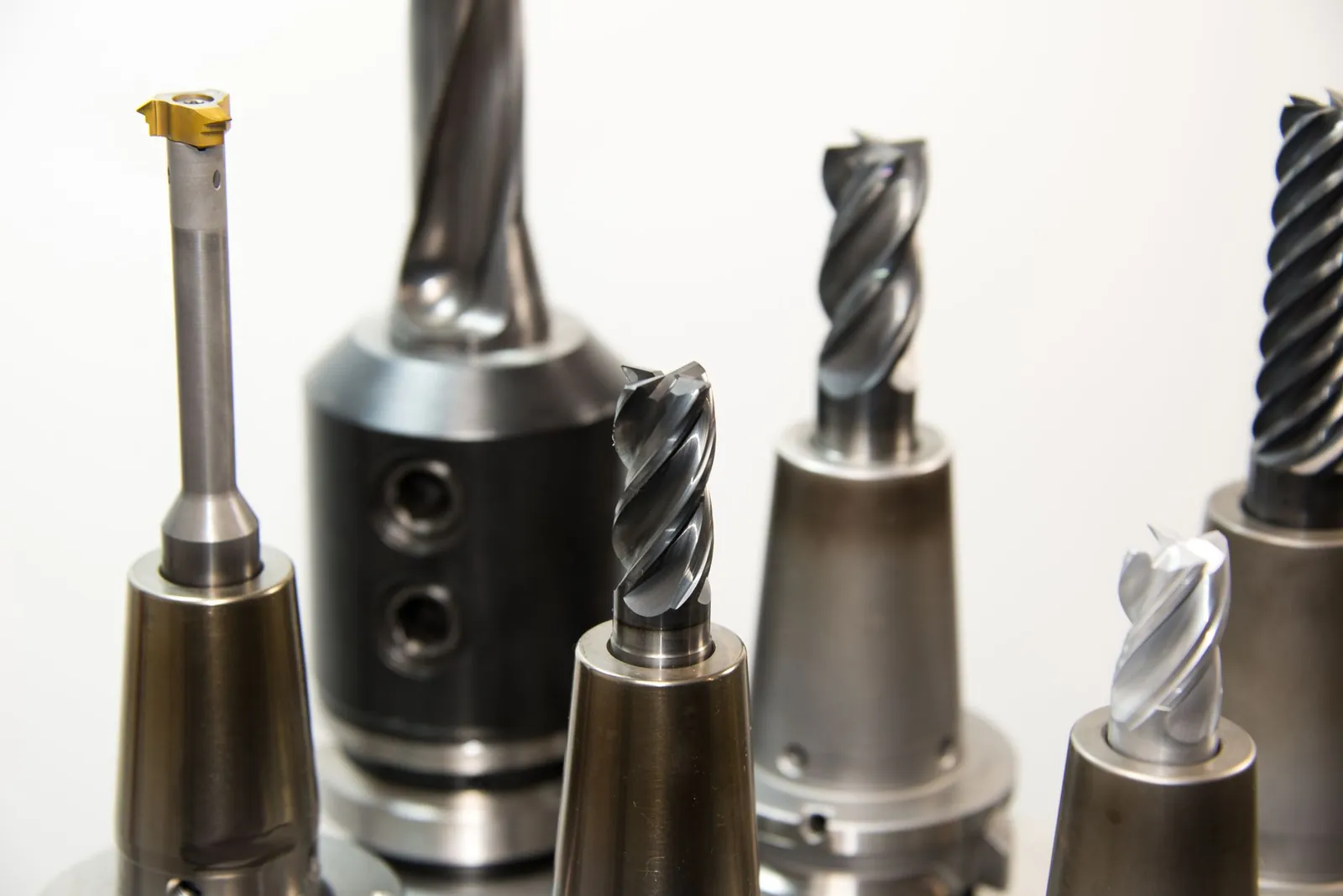A detailed view of assorted industrial drill bits showcasing precision engineering. Stock photo illustrating MTAR Technologies' new order story.