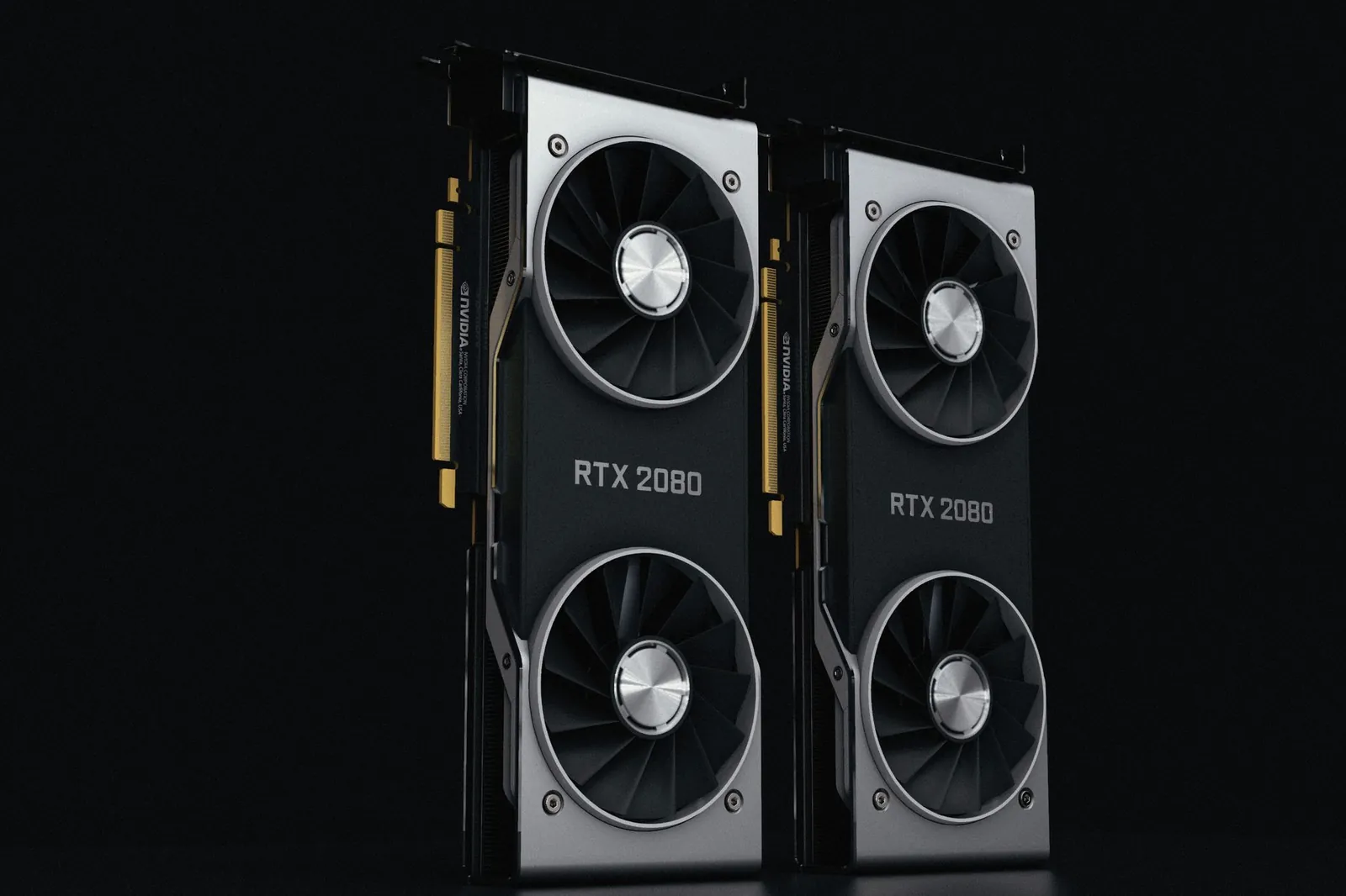 Close-up of two NVIDIA RTX 2080 graphics cards with dual fans, high-performance hardware. Stock photo illustrating E2E Networks' new order story.