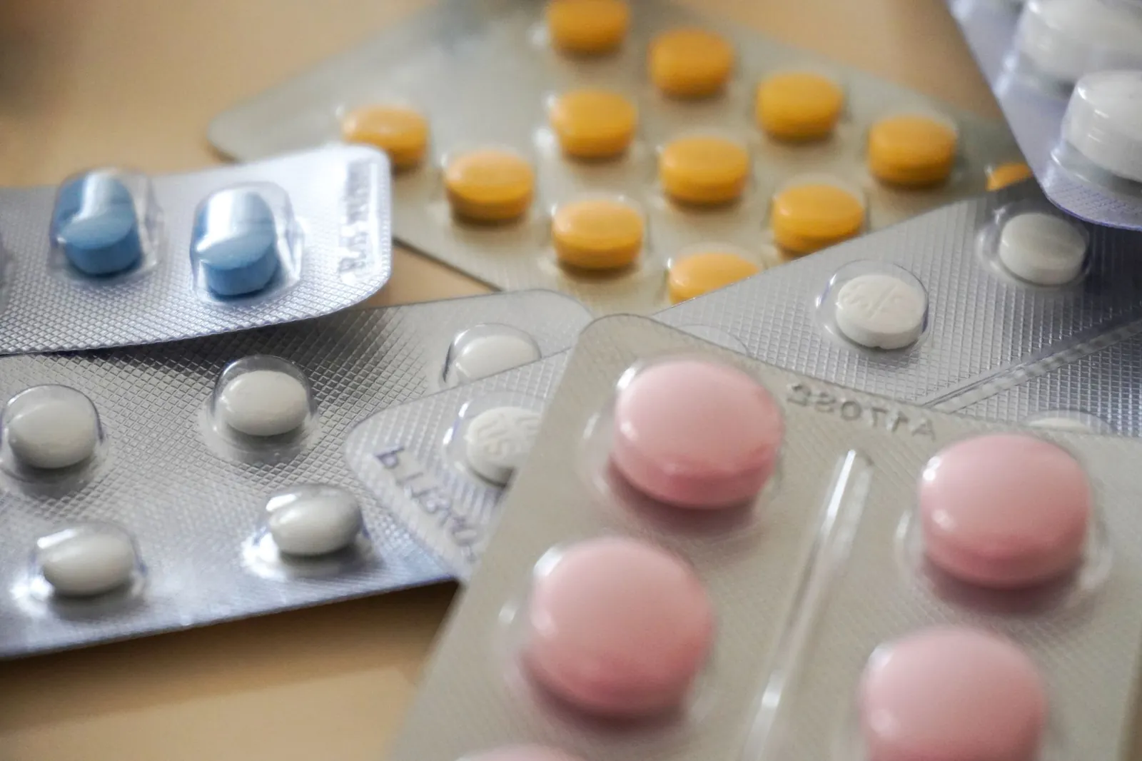 Close-up view of assorted colorful medication blister packs with diverse pills. Stock photo illustrating Dr. Reddy's Laboratories' product launched story.