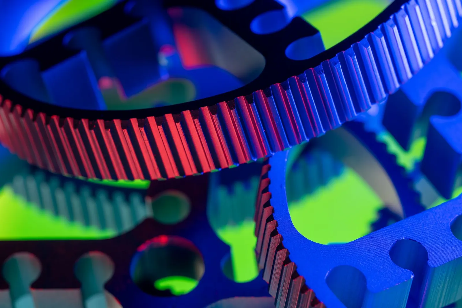 Vibrant close-up image of colorful industrial gears, showcasing precision engineering. Stock photo illustrating MTAR Technologies' new order story.