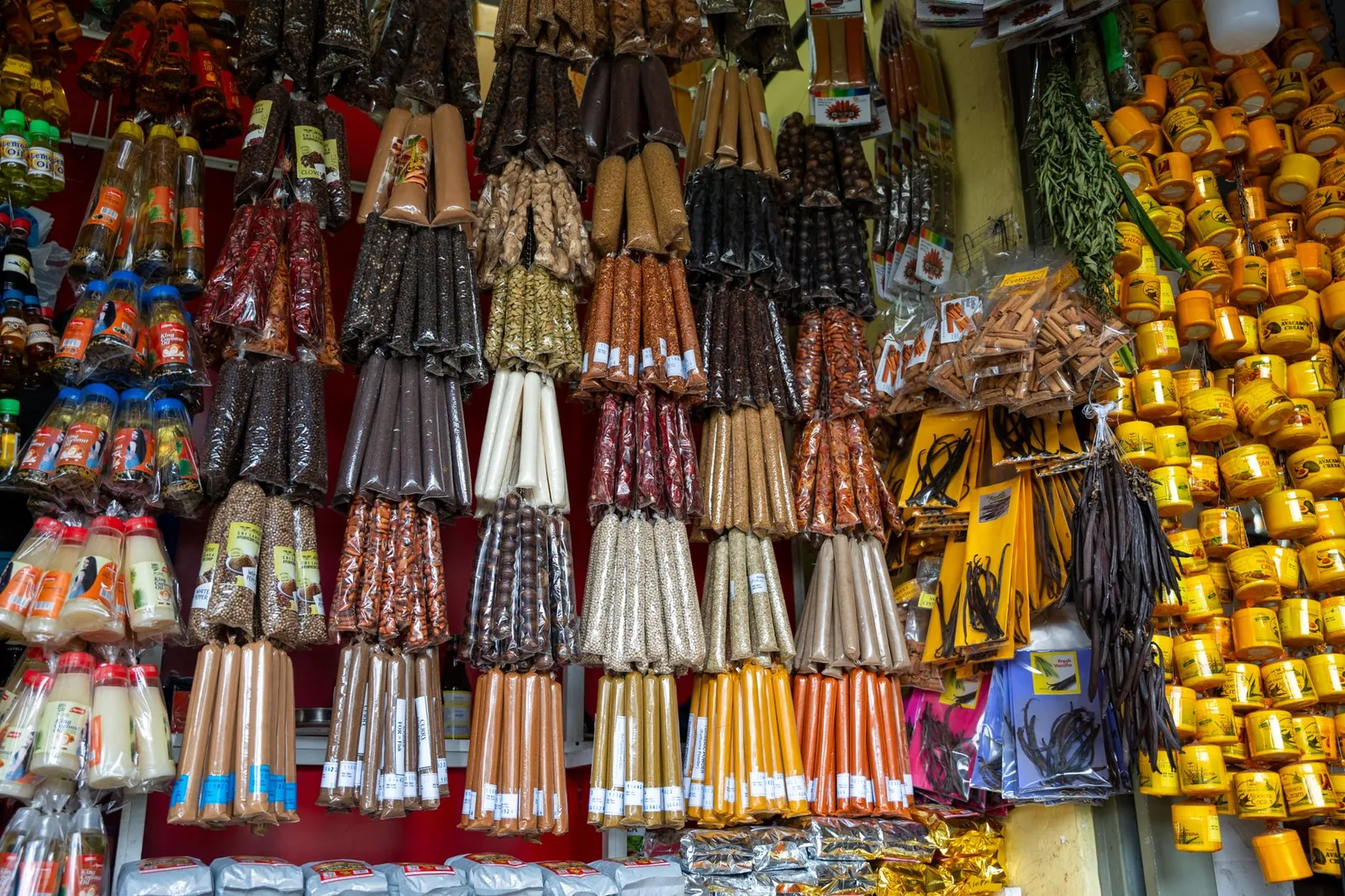 Vibrant market stall with a variety of spices, candles, and packaged goods on display. Stock photo illustrating Orkla India's product launched story.