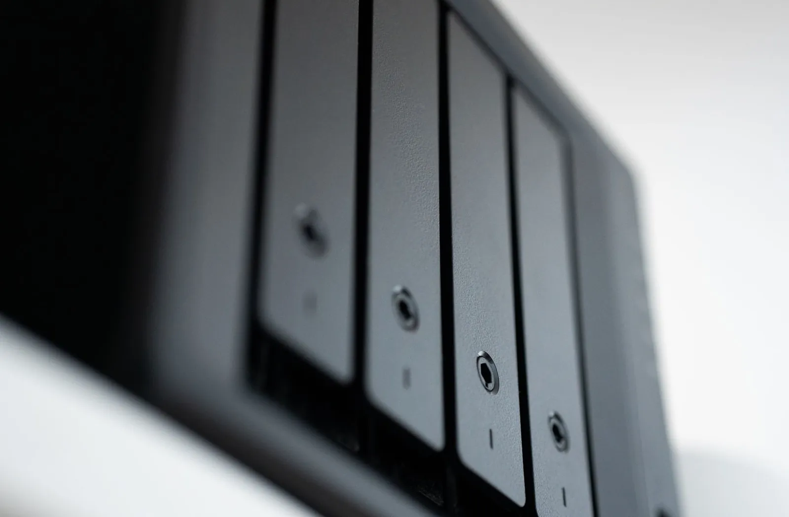 Detailed view of a black data storage unit highlighting modern technology and data management. Stock photo illustrating Blue Cloud Softech Solutions' partnership story.