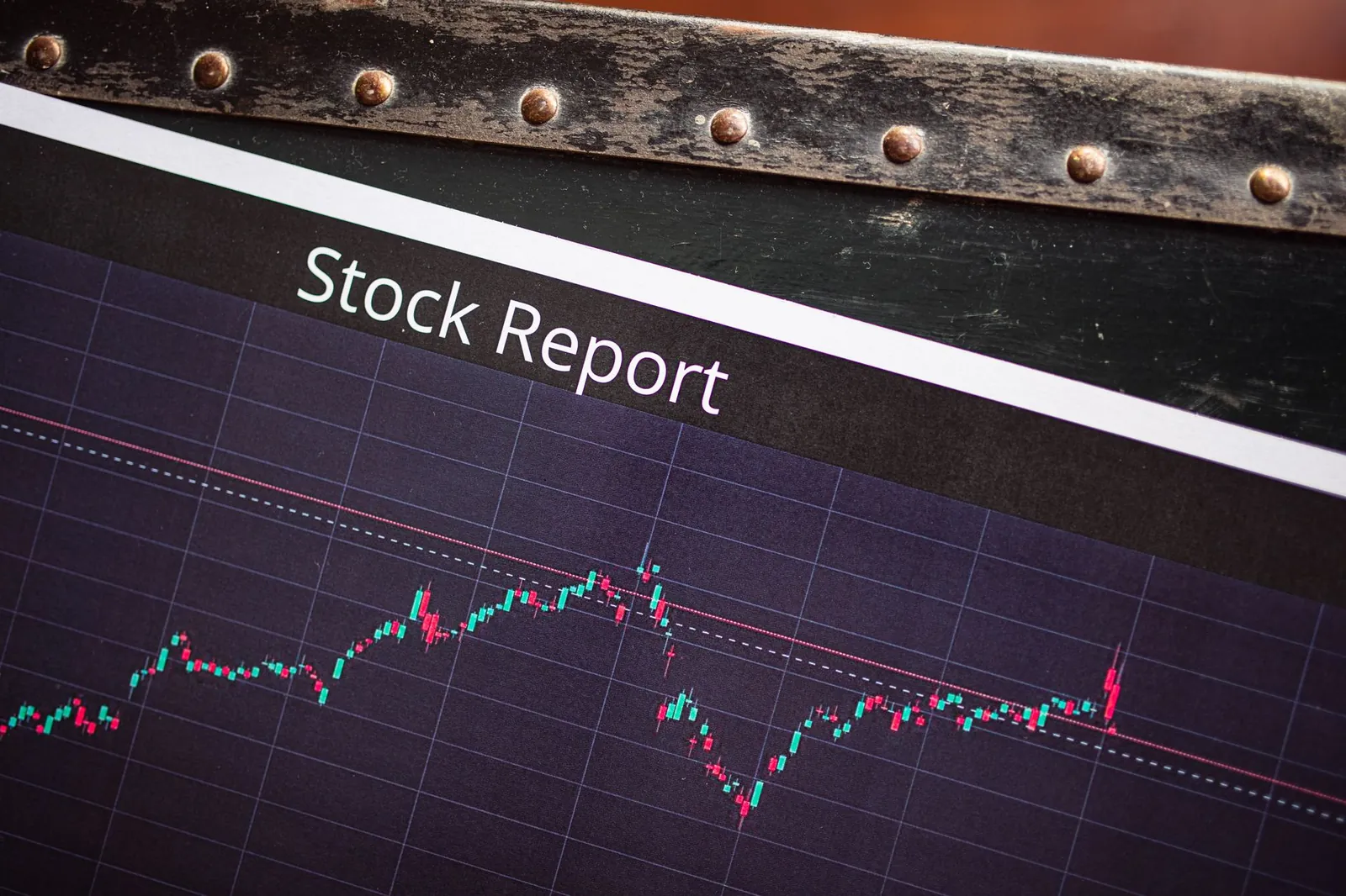 Detailed view of a stock report displaying a market performance graph with data trends. Stock photo for the ALFA News guide: Stock Market Alerts in India: A Complete Guide.