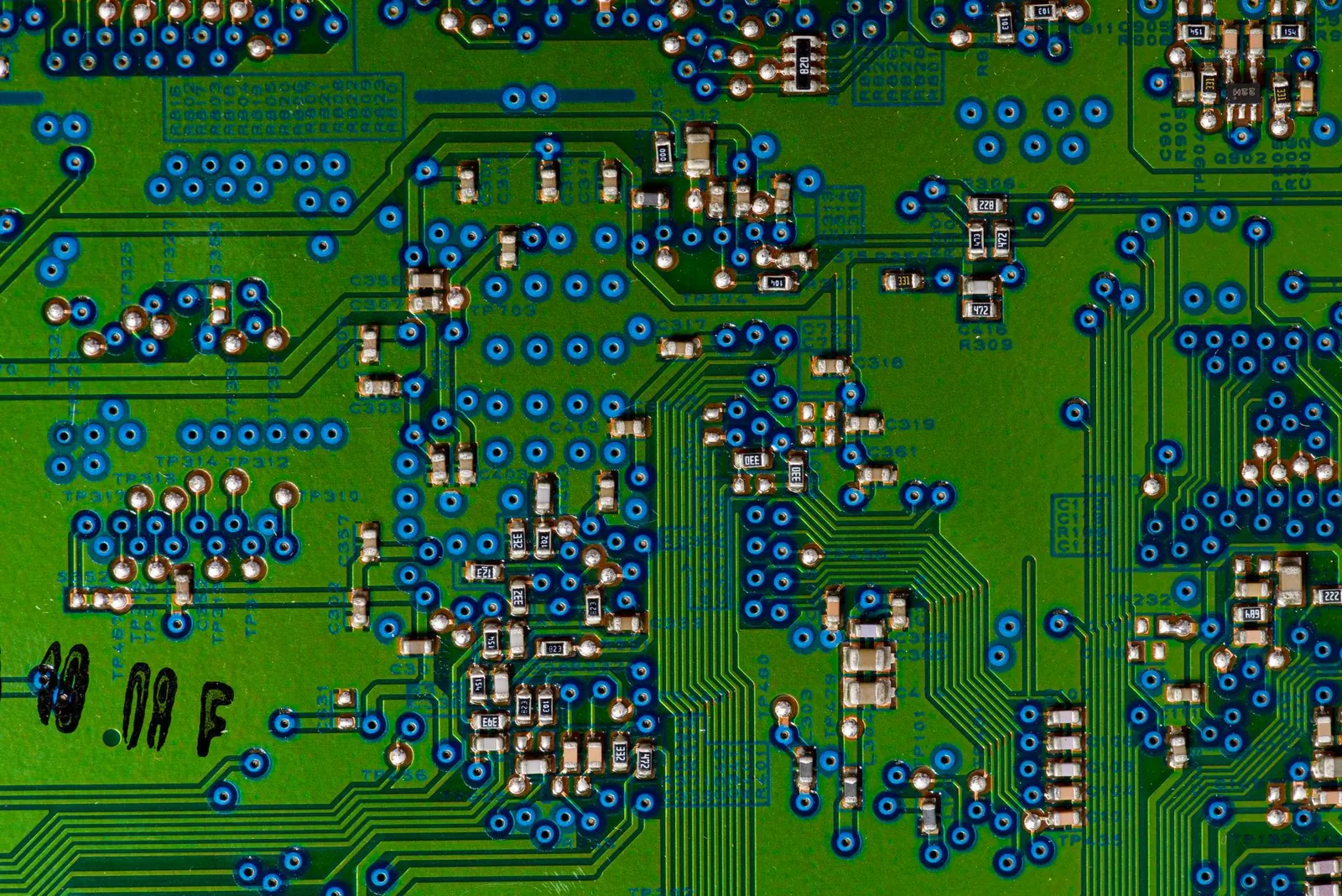 Detailed view of a circuit board highlighting electronic components. Stock photo illustrating Avalon Technologies' earning call story.