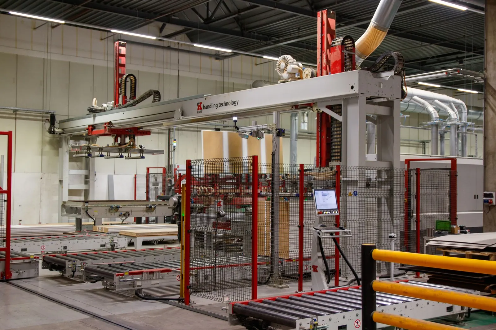Industrial machinery with robotic arm in a modern manufacturing facility. Stock photo illustrating Affordable Robotic & Automation's new order story.