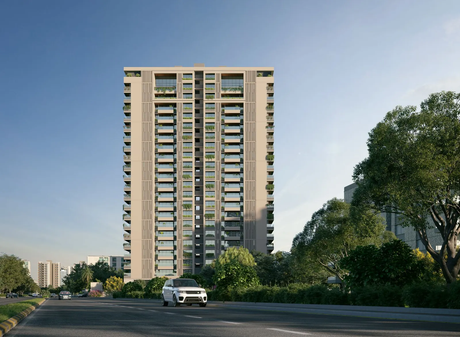 A contemporary high-rise apartment building in Ahmedabad, India with clear skies. Stock photo illustrating Signatureglobal (India)'s earning call story.