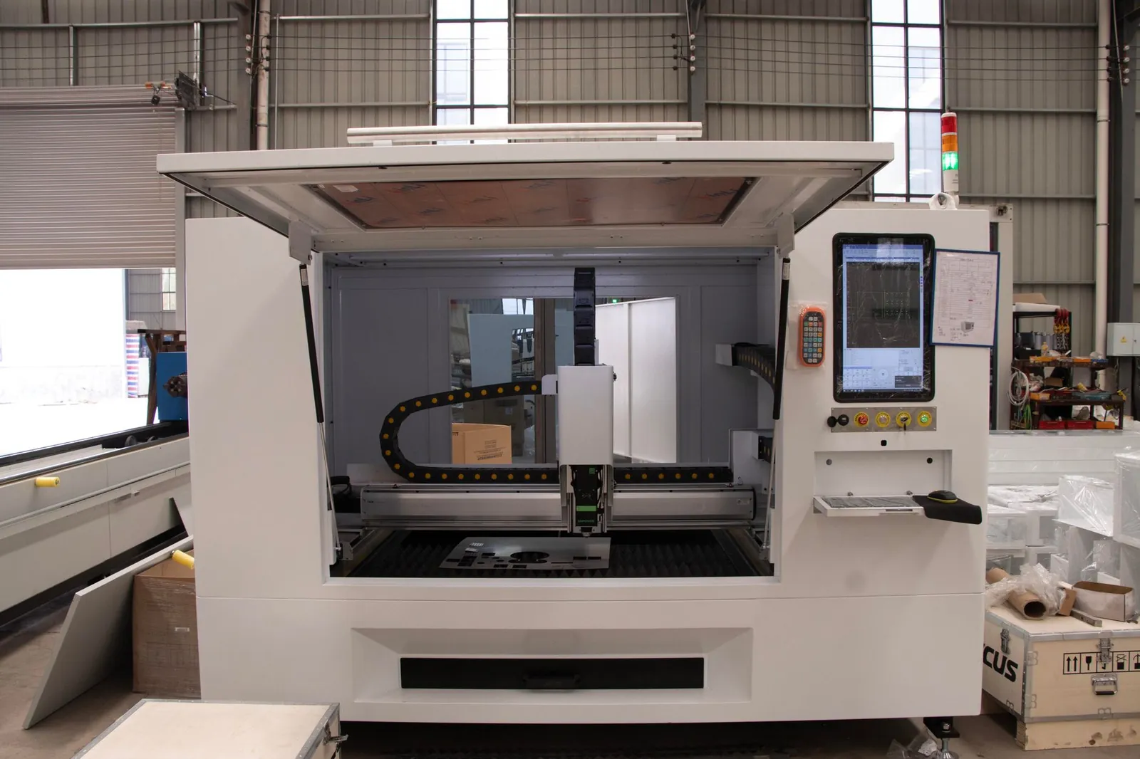Modern CNC machine in a factory, showcasing advanced industrial automation technology. Stock photo illustrating Waaree Energies' earning call story.
