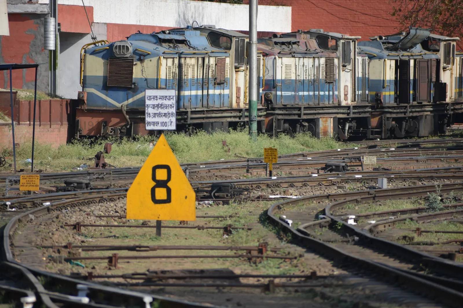 Historic Kalka Shimla Railway yard showcasing classic trains on curved rail tracks, India. Stock photo illustrating G R Infraprojects' new order story.