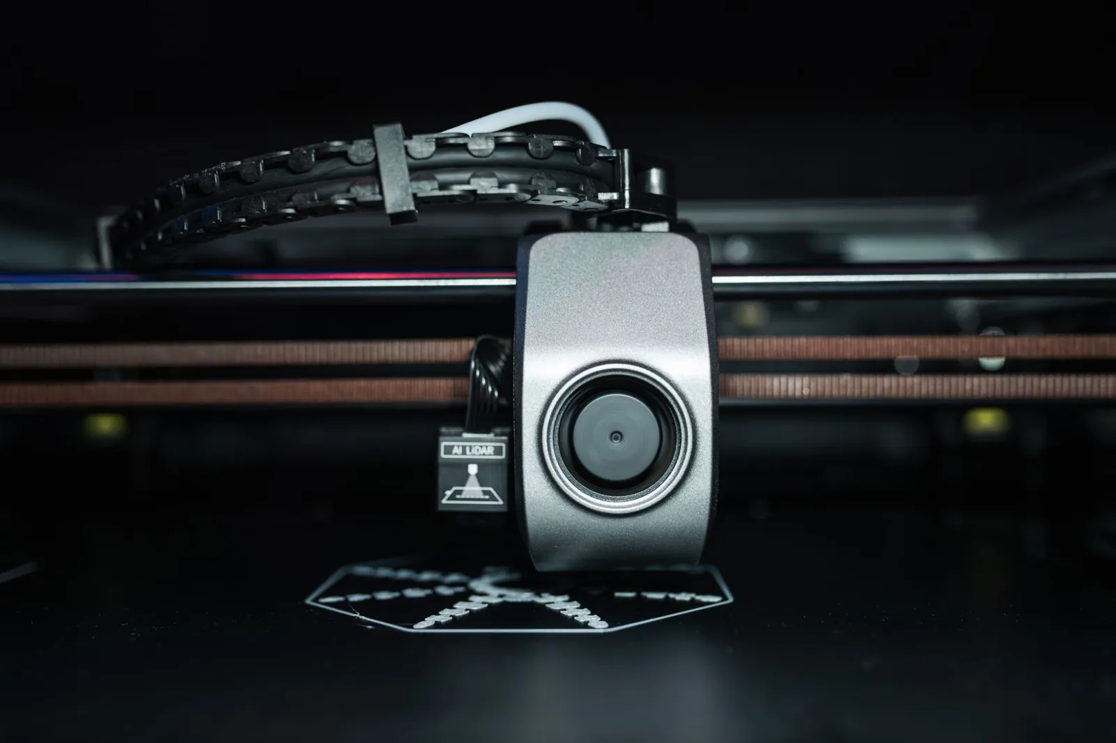 Detailed close-up of a 3D printer extrusion head in focus, showcasing modern technology. Stock photo illustrating Rajoo Engineers' partnership story.